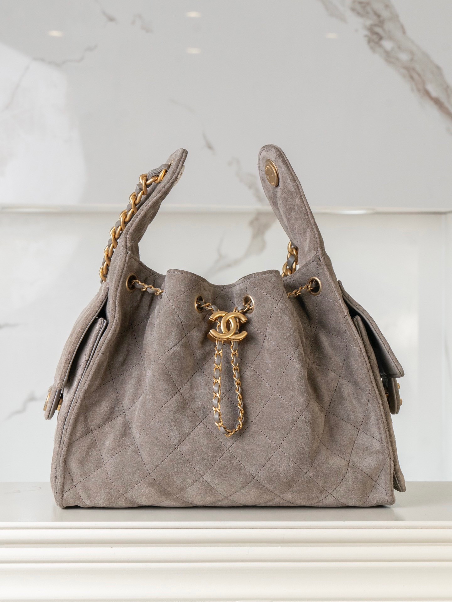 Chanel Small suede hobo drawstring bucket bag