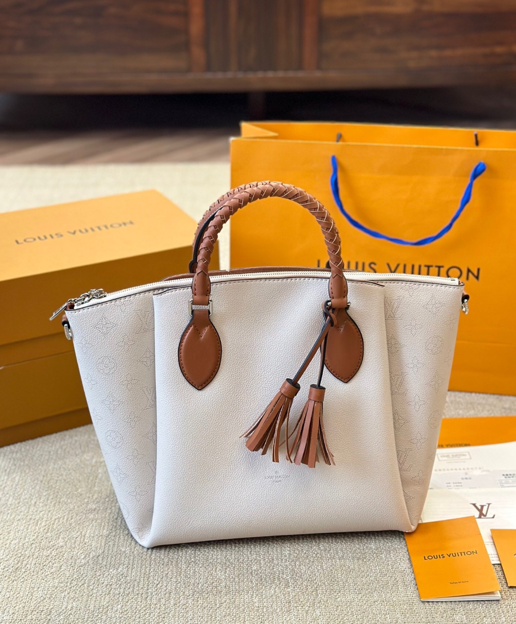 Louis Vuitton haumea tote bag