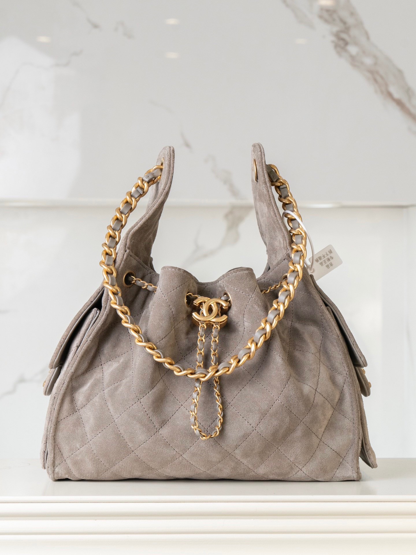 Chanel Small suede hobo drawstring bucket bag