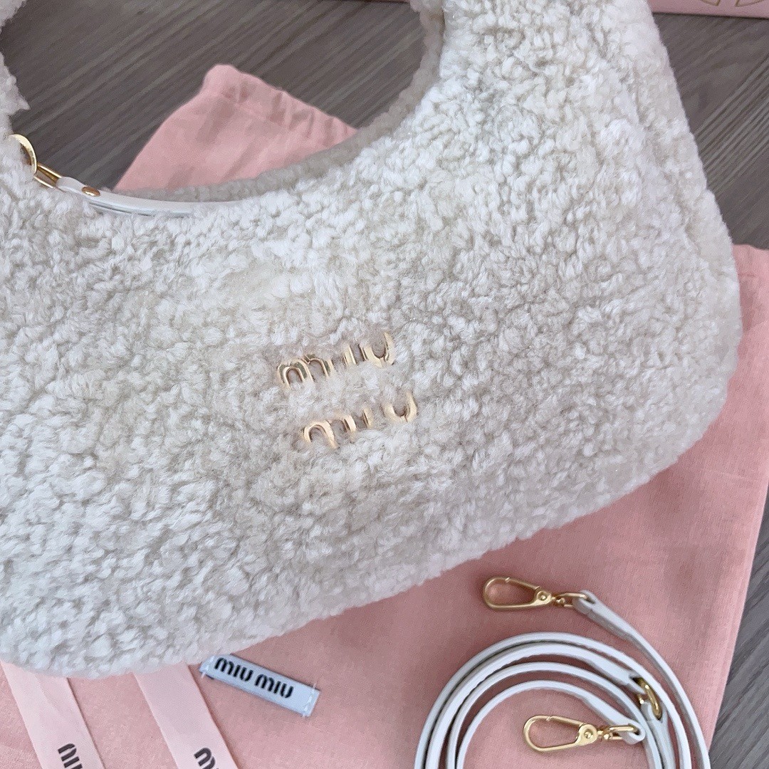 Miumiu Wander Small Shearling Crescent Bag