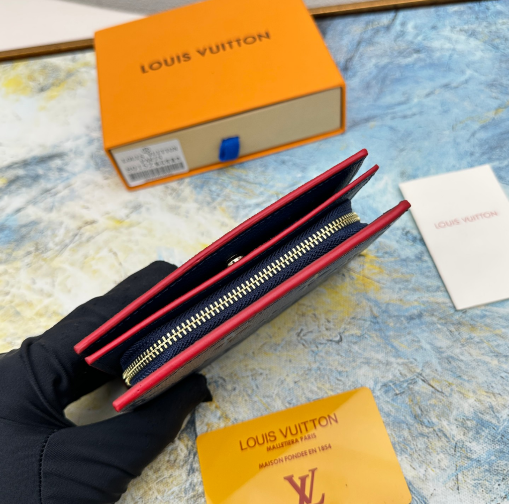 Louis Vuitton Top grain cowhide embossed zipper dark wallet