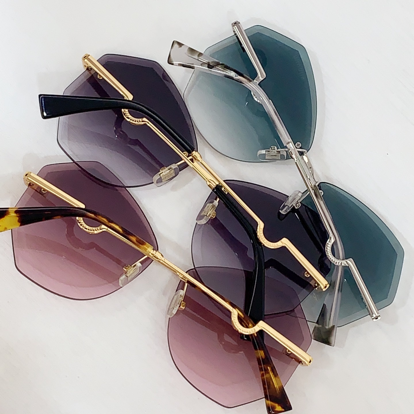 Miumiu frameless sunglasses