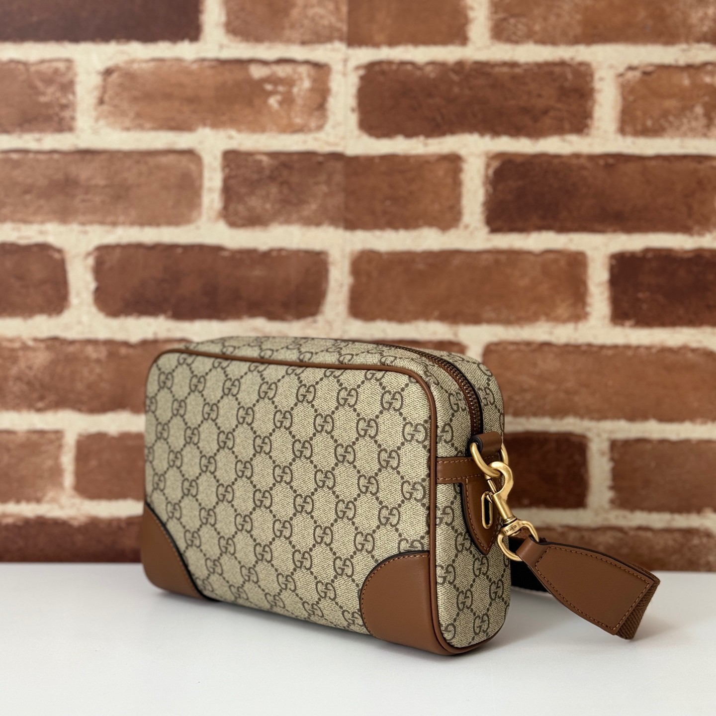 GUCCI Emblem GG small crossbody bag