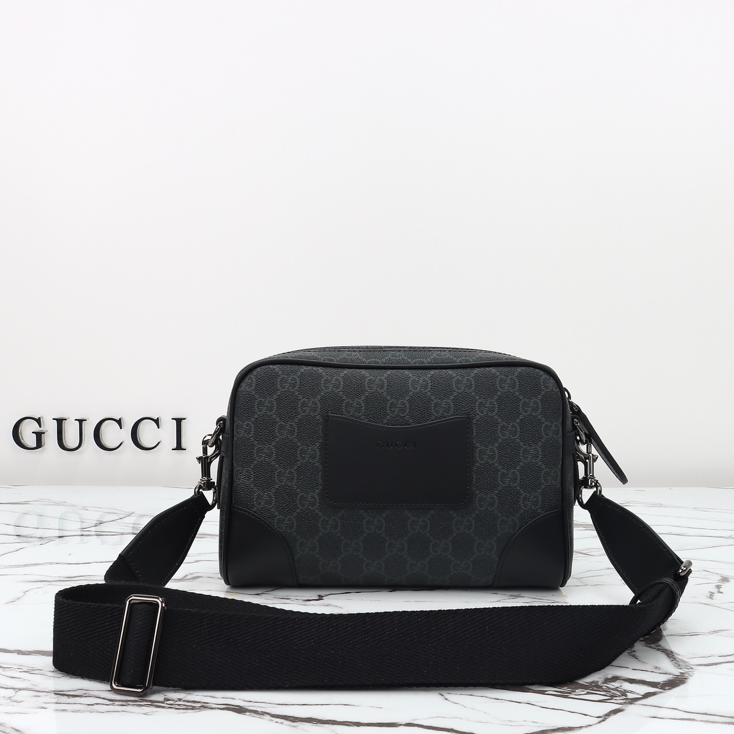 GUCCI Emblem GG small crossbody bag