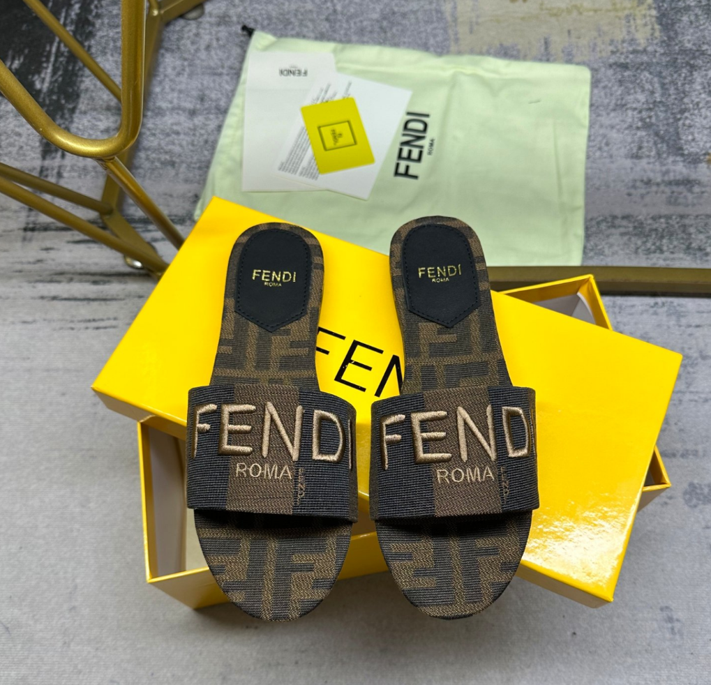 Fendi's latest jacquard striped canvas flat slippers