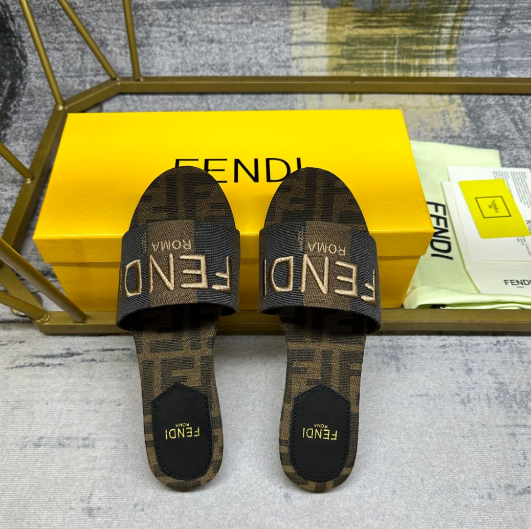 Fendi's latest jacquard striped canvas flat slippers