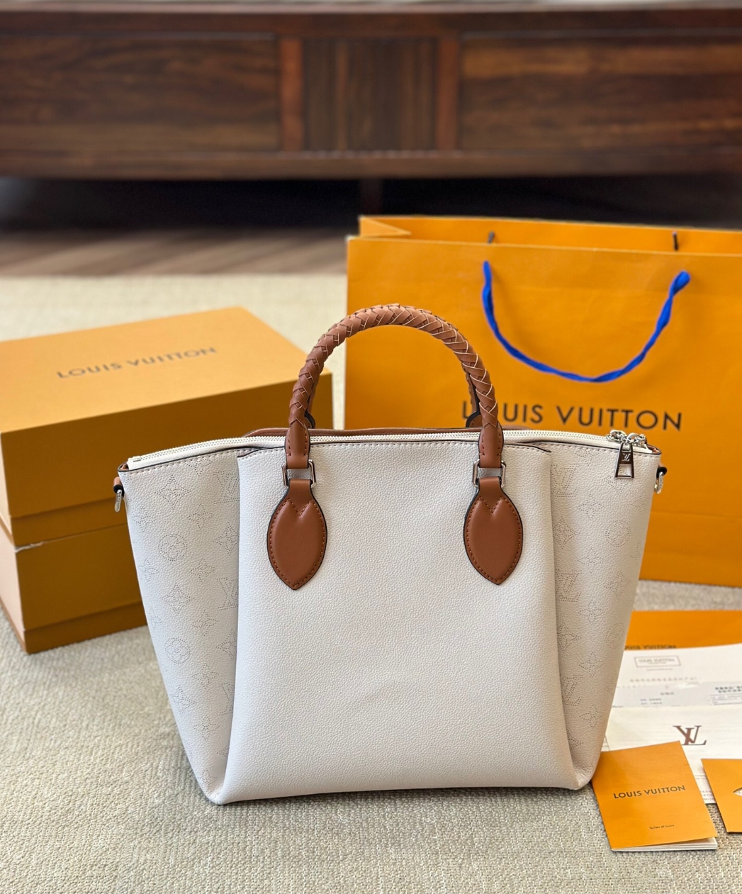 Louis Vuitton haumea tote bag