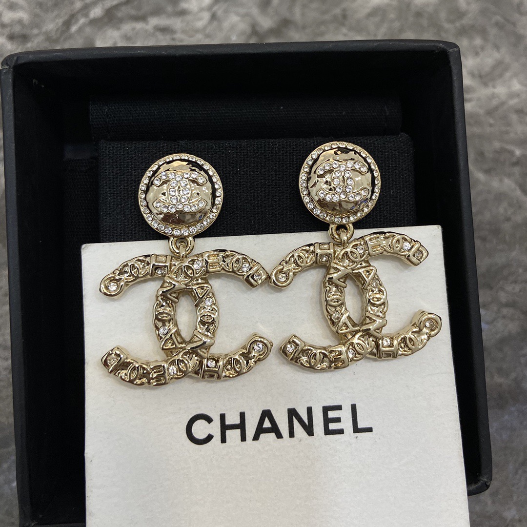 Chanel embossed double c drop earrings