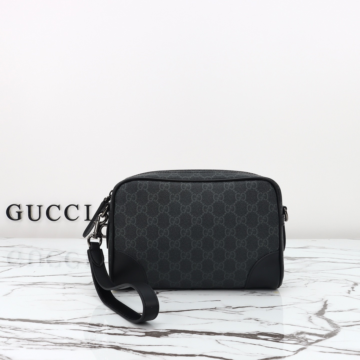 GUCCI Emblem GG small crossbody bag