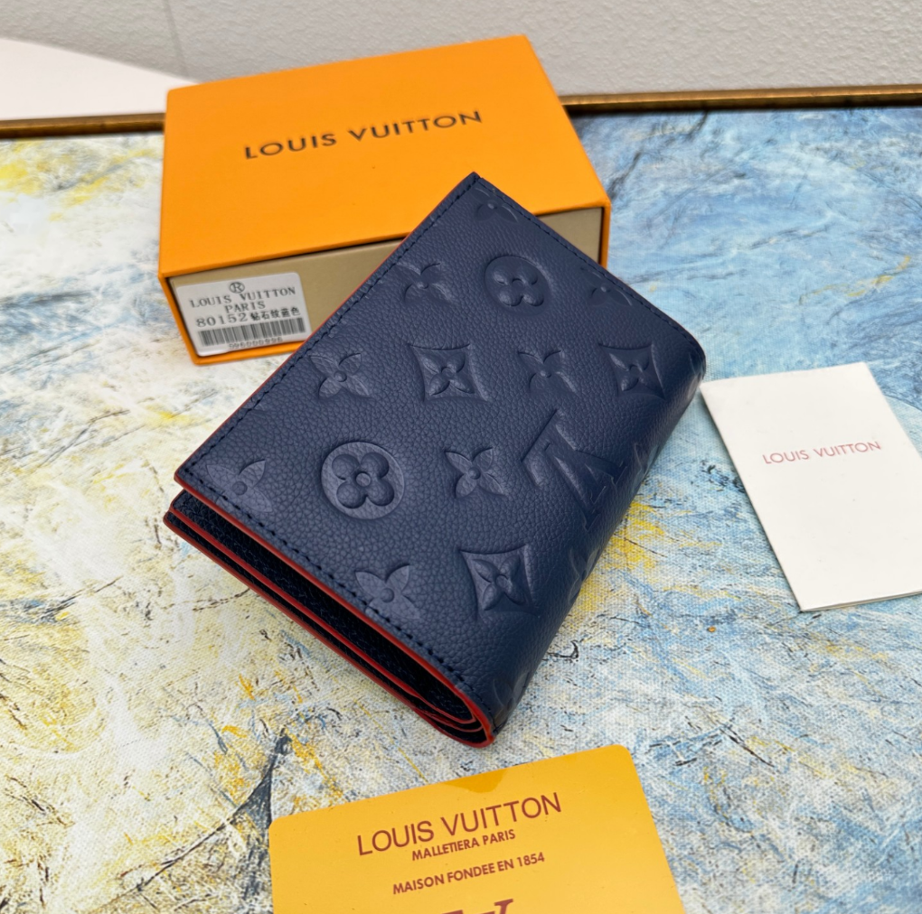 Louis Vuitton Top grain cowhide embossed zipper dark wallet