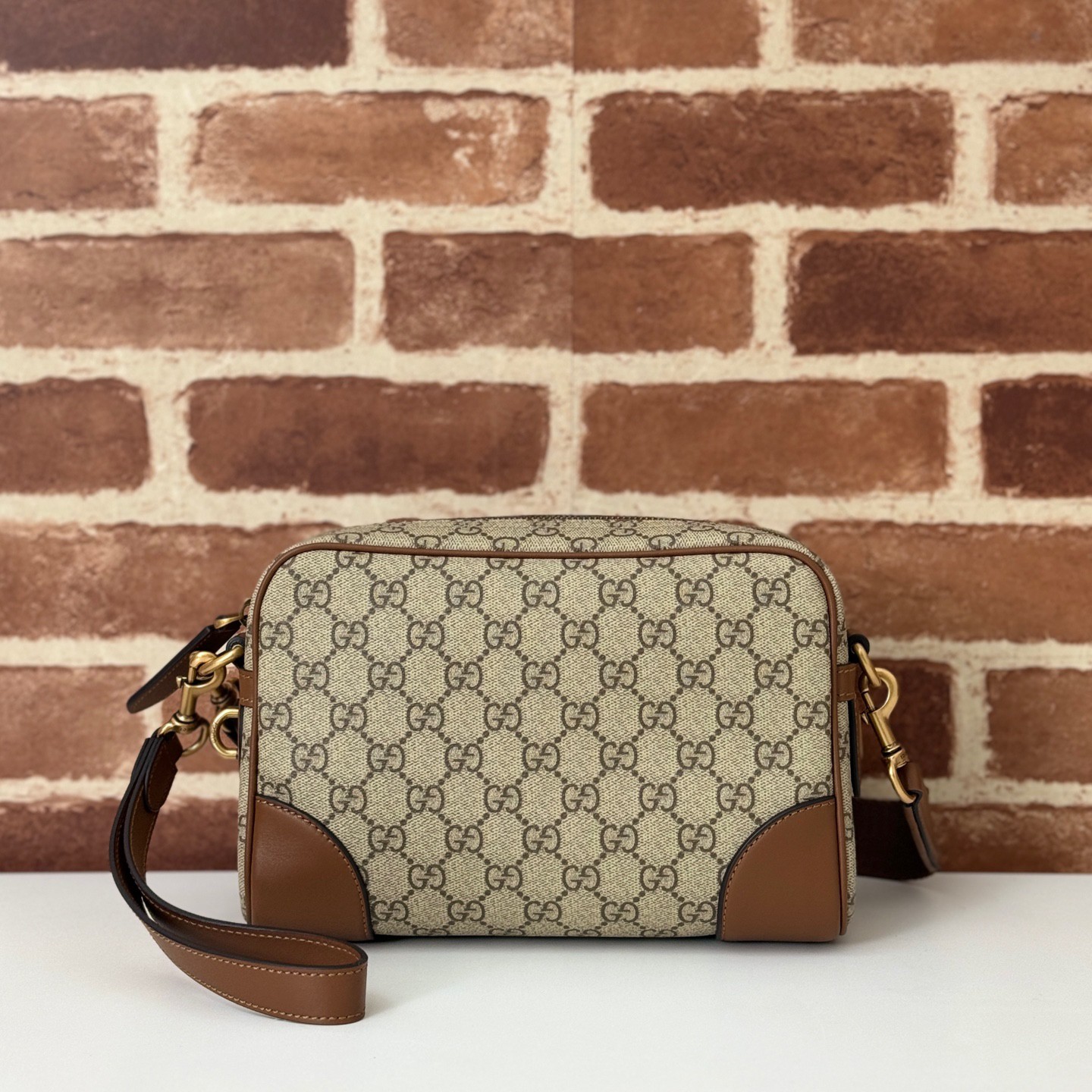 GUCCI Emblem GG small crossbody bag