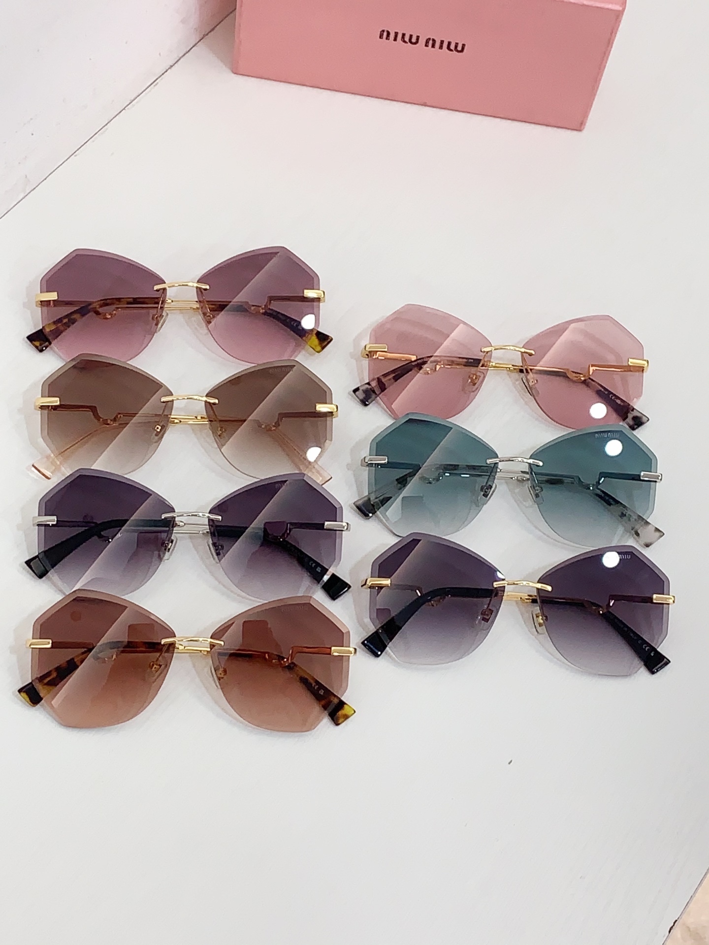 Miumiu frameless sunglasses