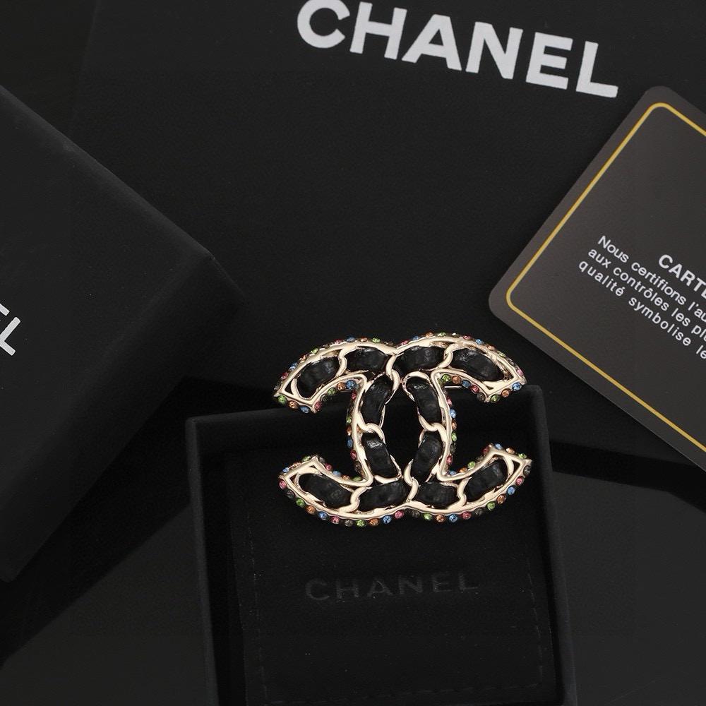Chanel new classic black leather brooch with colored diamonds Jewelry