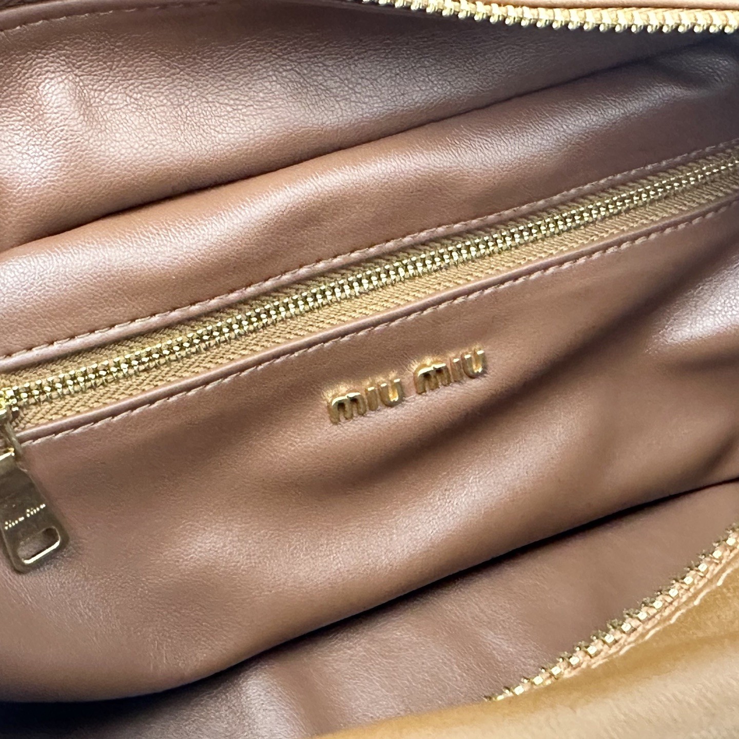 MiuMiu Pocket Bag in Washed Nappa Leather