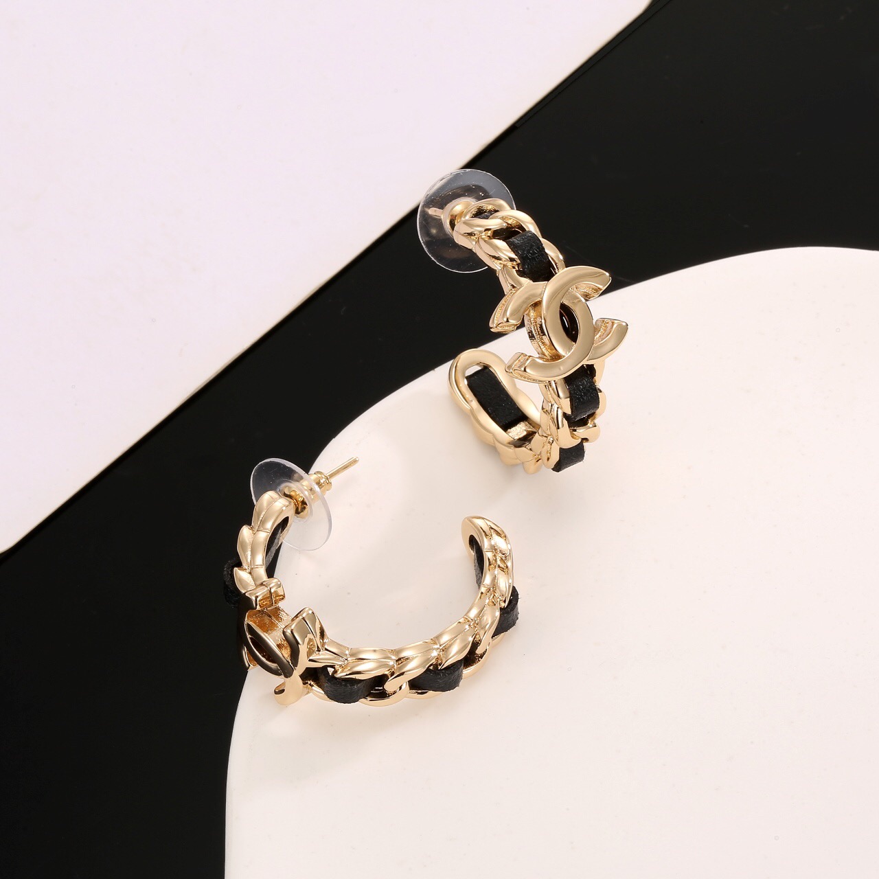 Chanel classic black leather stud earrings
