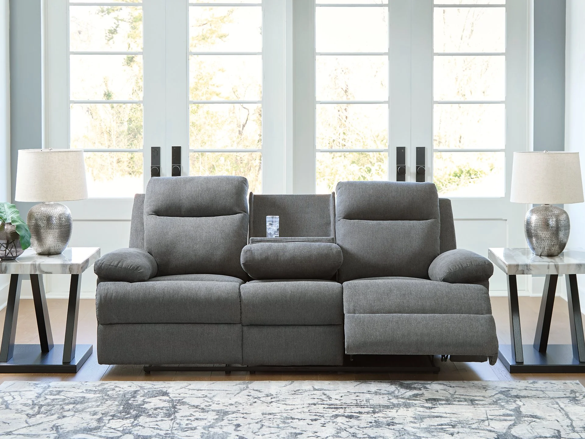 Side-Swipe Reclining Sofa with Drop Down Table