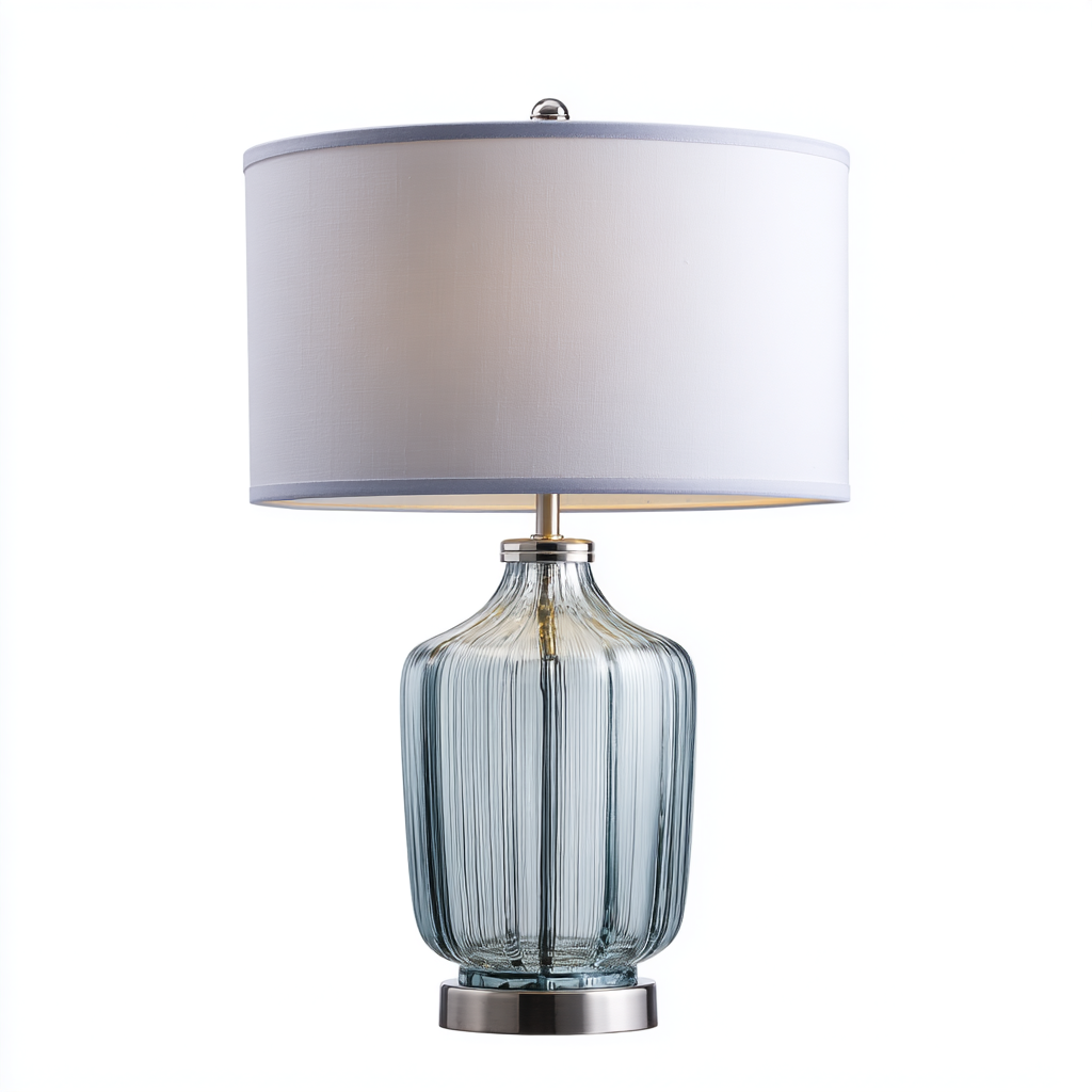 Lámpara de mesa con base de vidrio azul y pantalla blanca