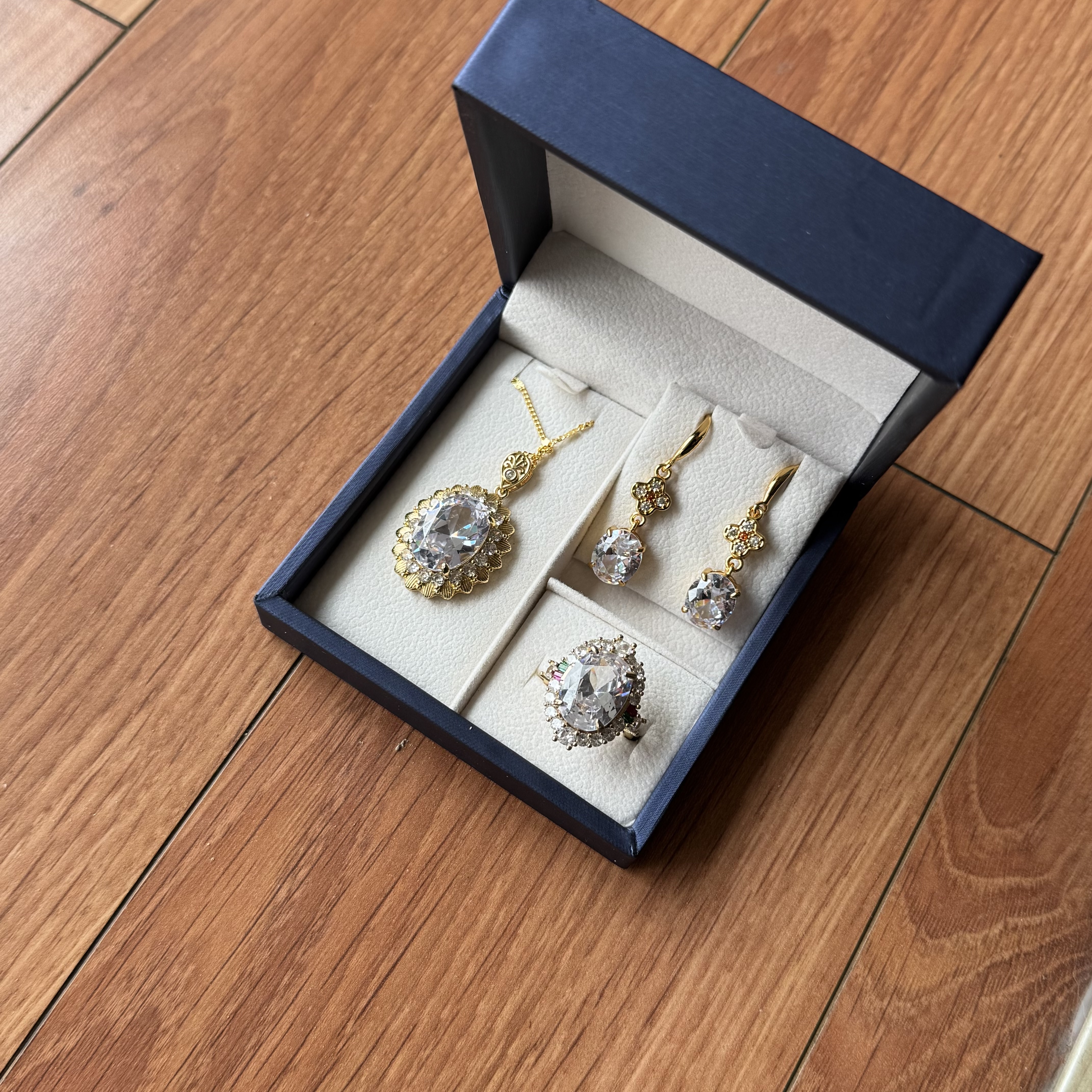 Earrings + necklace + ring