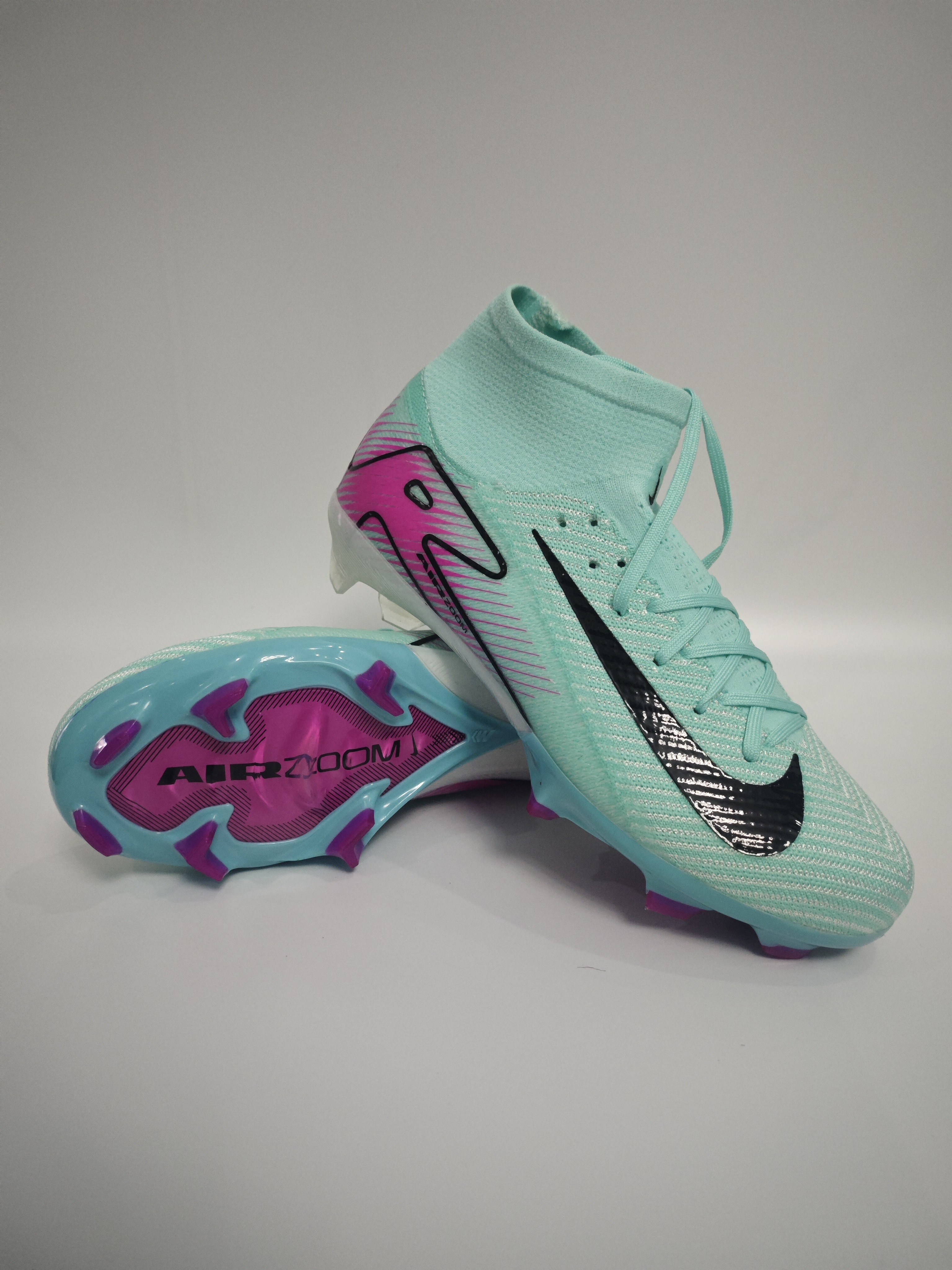 Nike Mercurial 16 FG Soccer Cleats with Built-in Bonded Pack: Full Air Cushion for All-Match Comfort, Waterproof Knit for Wet Pitches