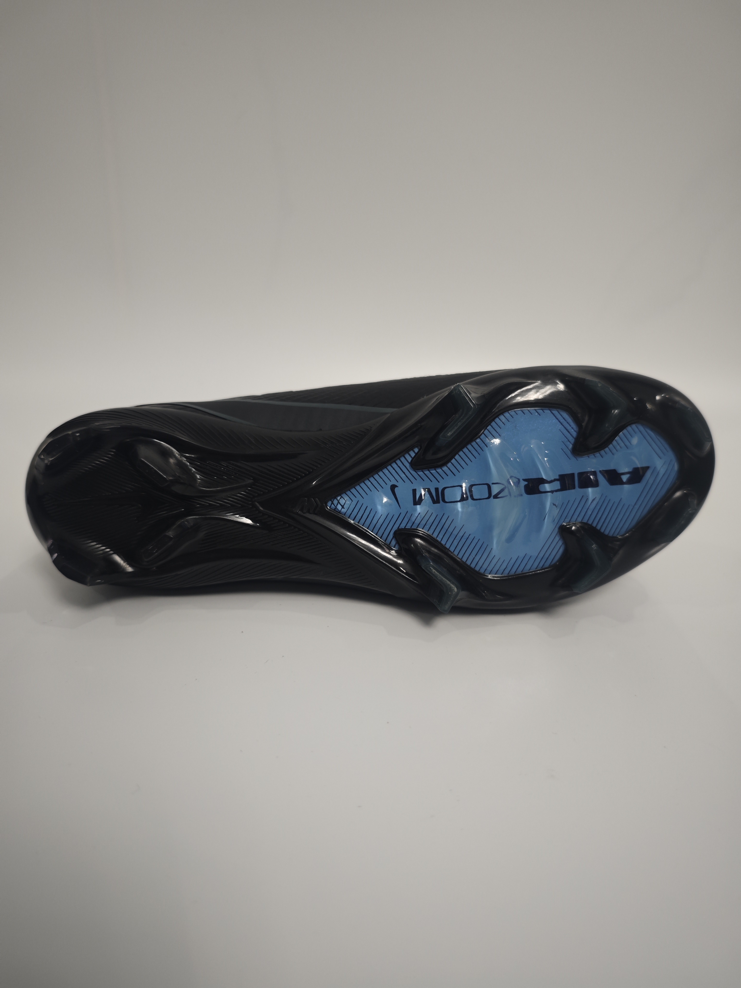 Nike Mercurial 16 FG Soccer Cleats with Built-in Bonded Pack: Full Air Cushion for All-Match Comfort, Waterproof Knit for Wet Pitches