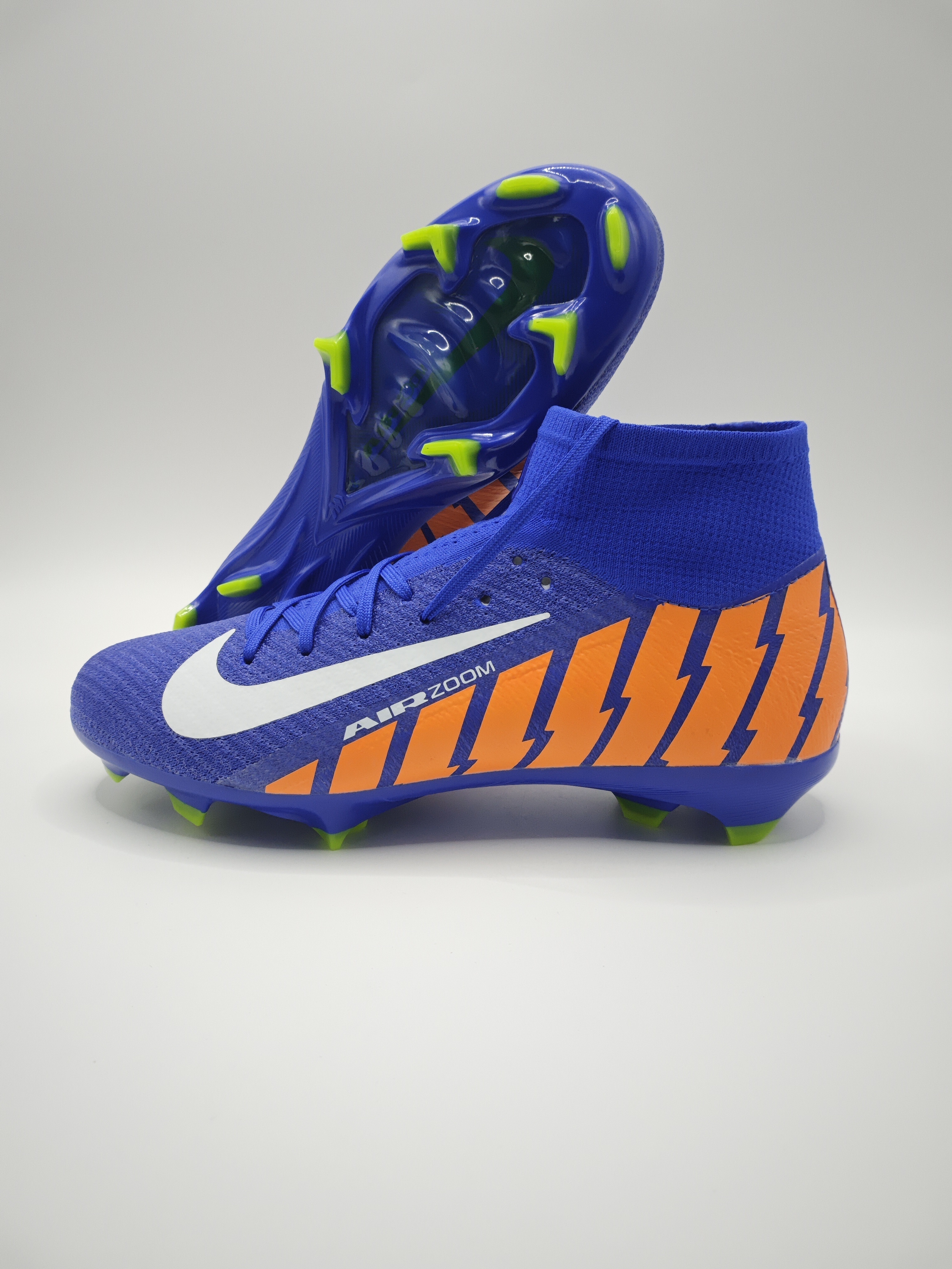 Nike Mercurial 16 FG Soccer Cleats with Built-in Bonded Pack: Full Air Cushion for All-Game Comfort, Waterproof Knit for Rainy Pitches