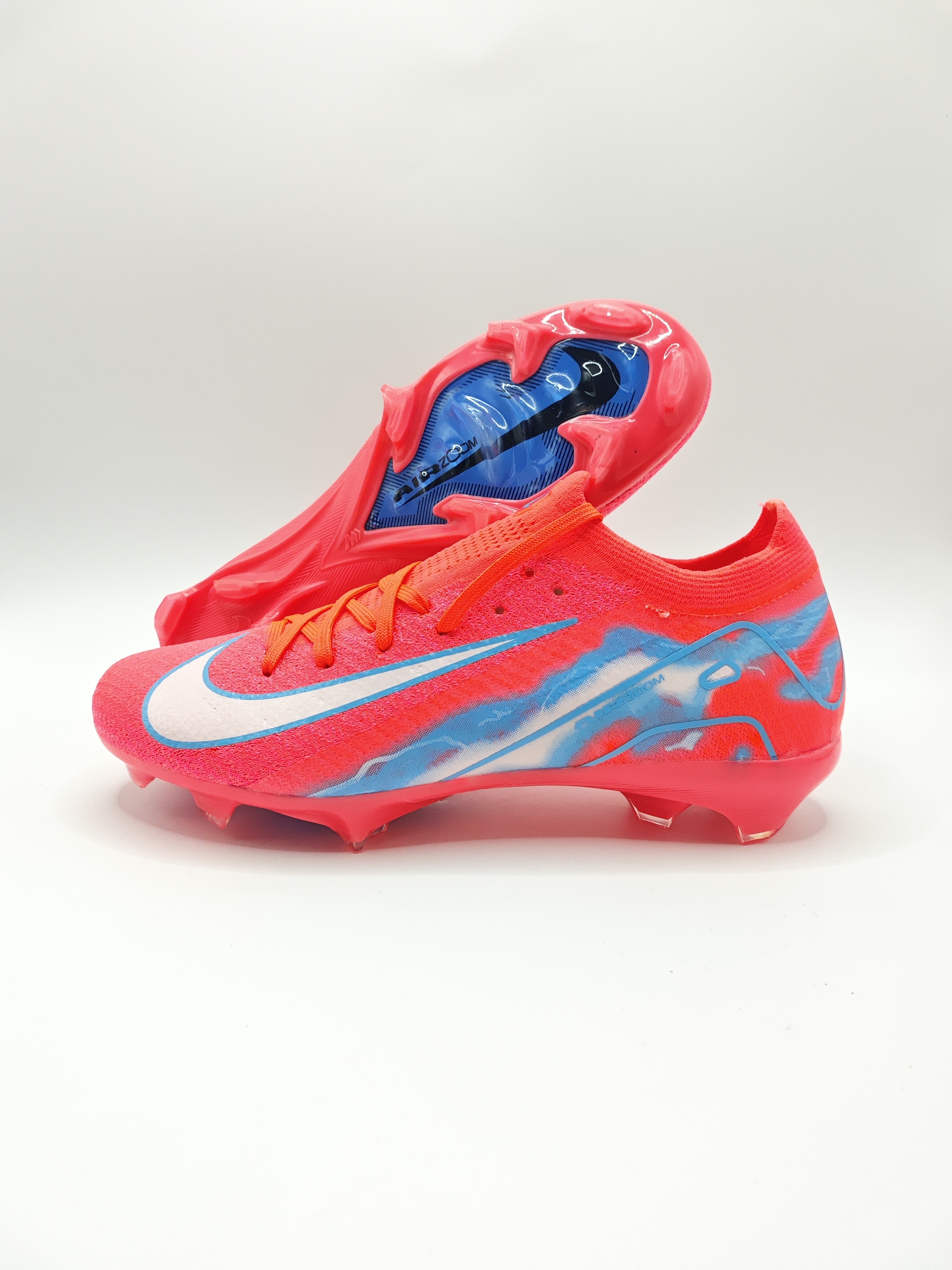 Nike Mercurial 16 FG Soccer Cleats with Built-in Bonded Pack: Full Air Cushion for All-Game Comfort, Waterproof Knit for Wet Pitches