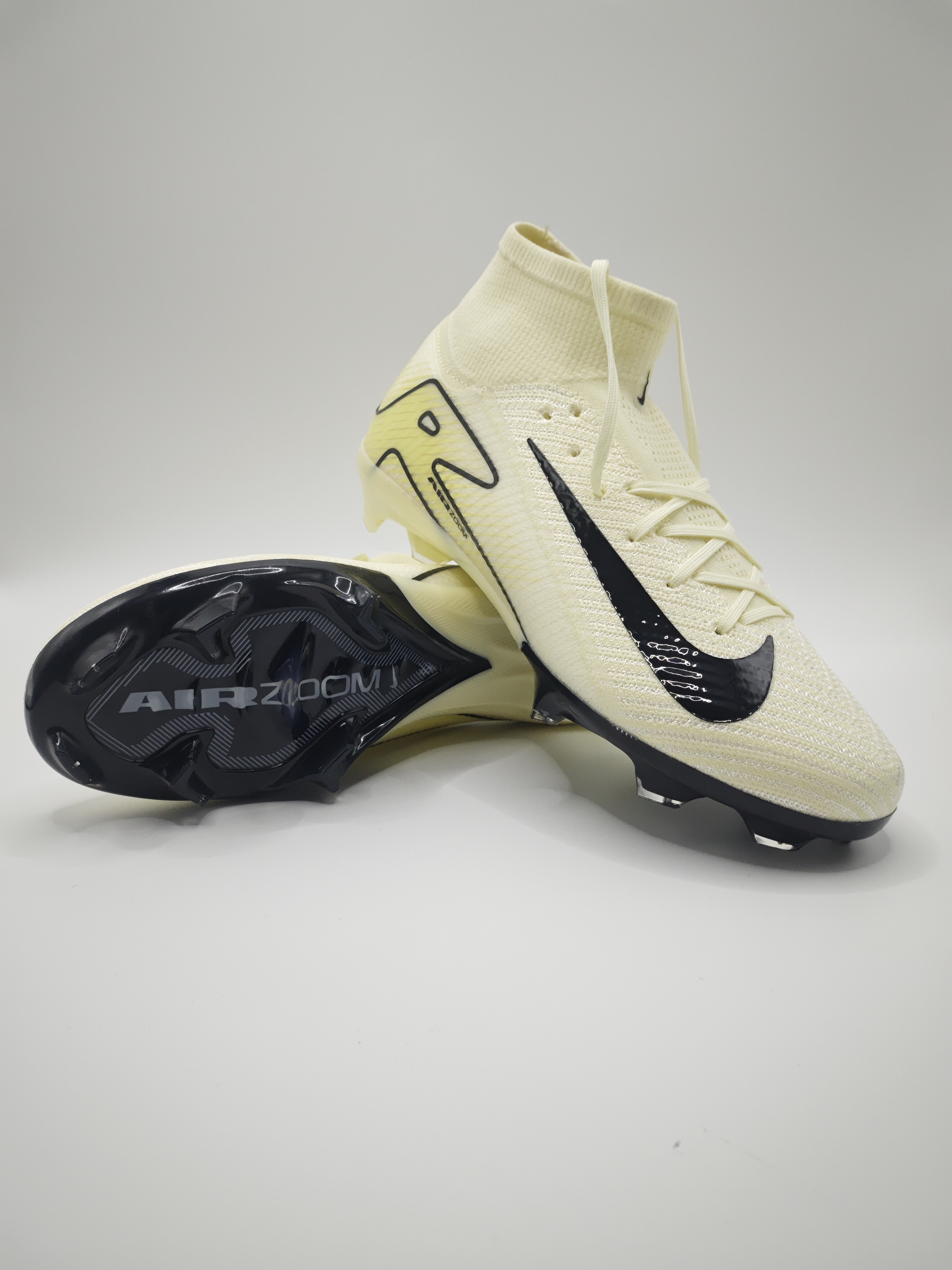 Nike Mercurial 16 FG Soccer Cleats with Built-in Bonded Pack: Full Air Cushion for All-Match Comfort, Waterproof Knit for Wet Pitches