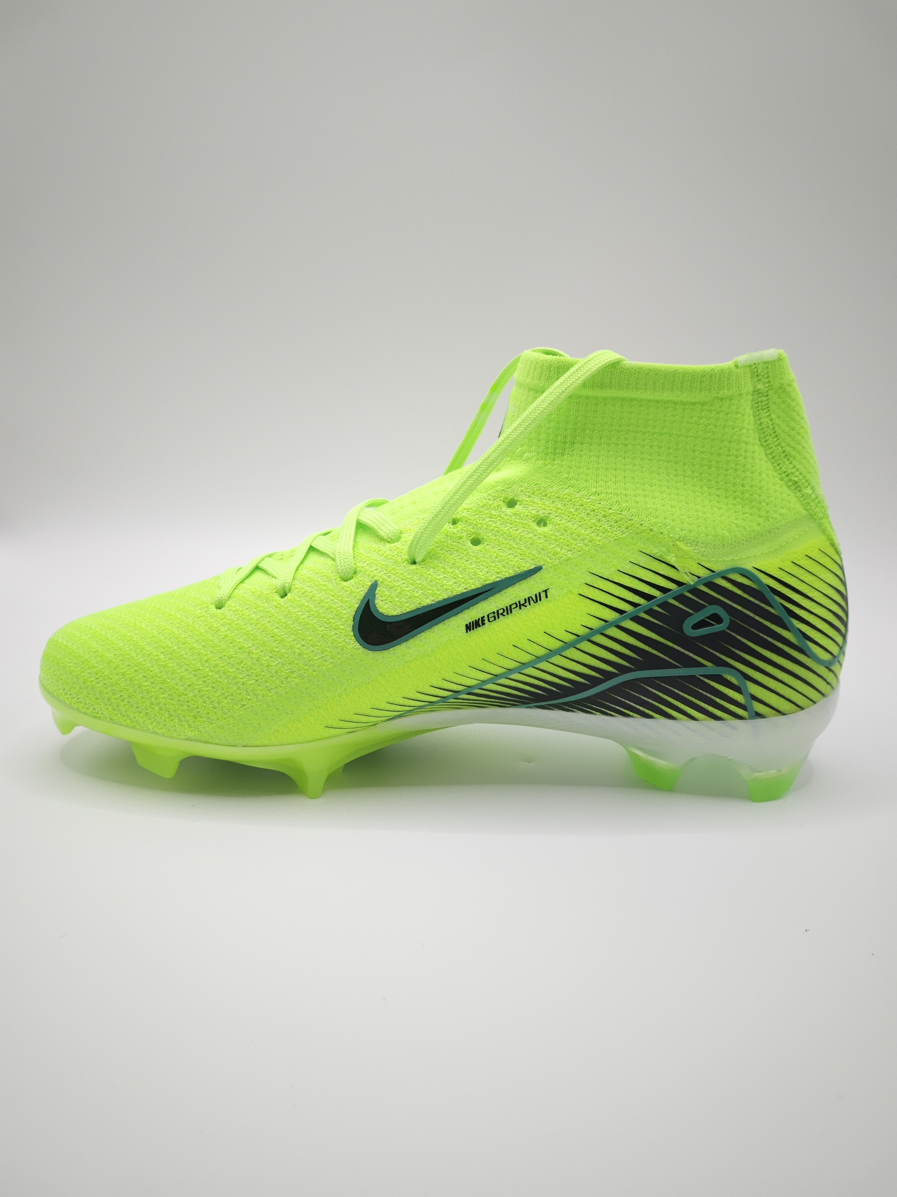 Nike Mercurial 16 FG Soccer Cleats with Built-in Bonded Pack: Full Air Cushion for All-Game Comfort, Waterproof Knit for Rainy Fields