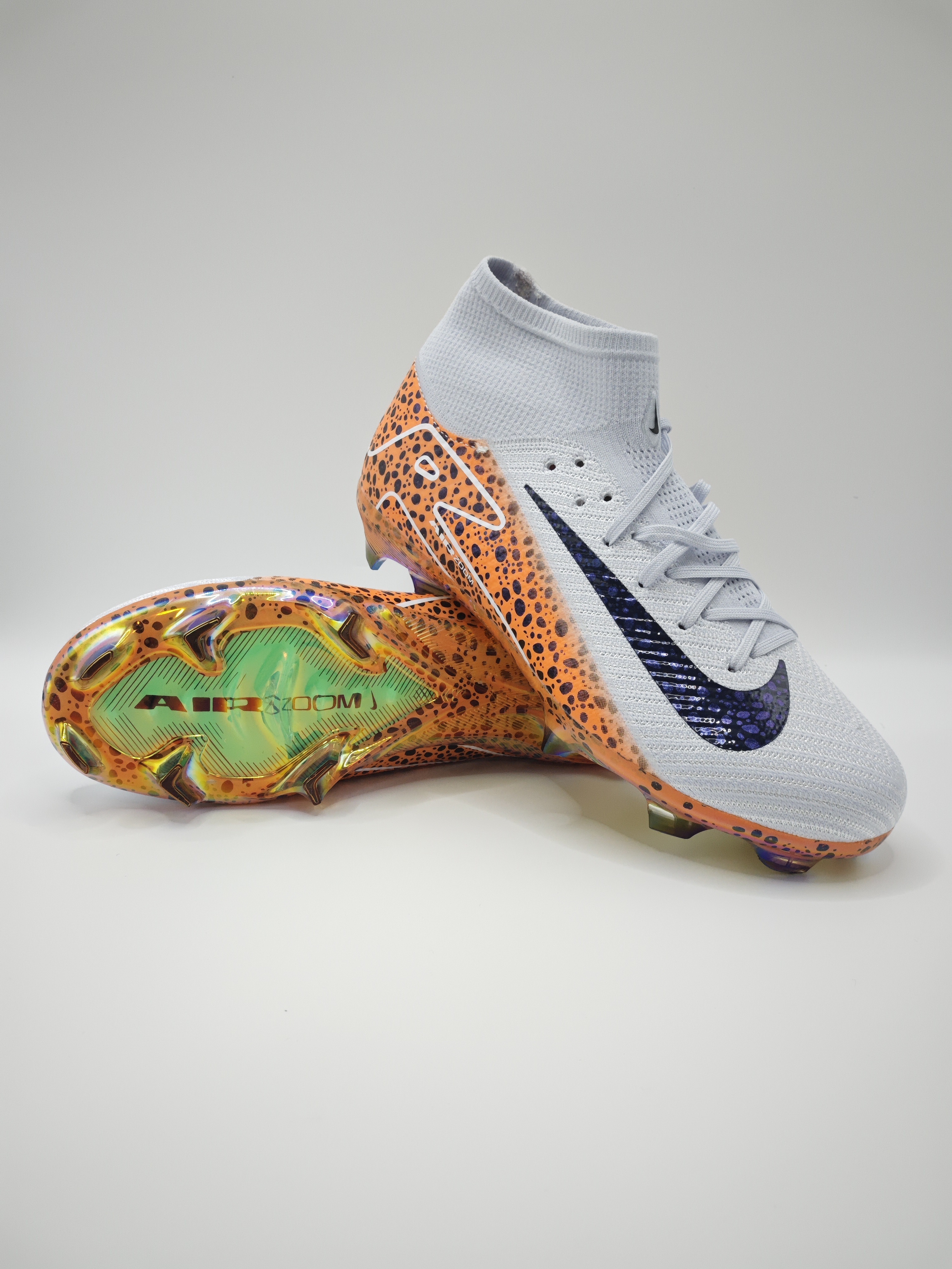 Nike Mercurial 16 FG Soccer Cleats with Built-in Bonded Pack: Full Air Cushion for All-Match Comfort, Waterproof Knit for Wet Fields