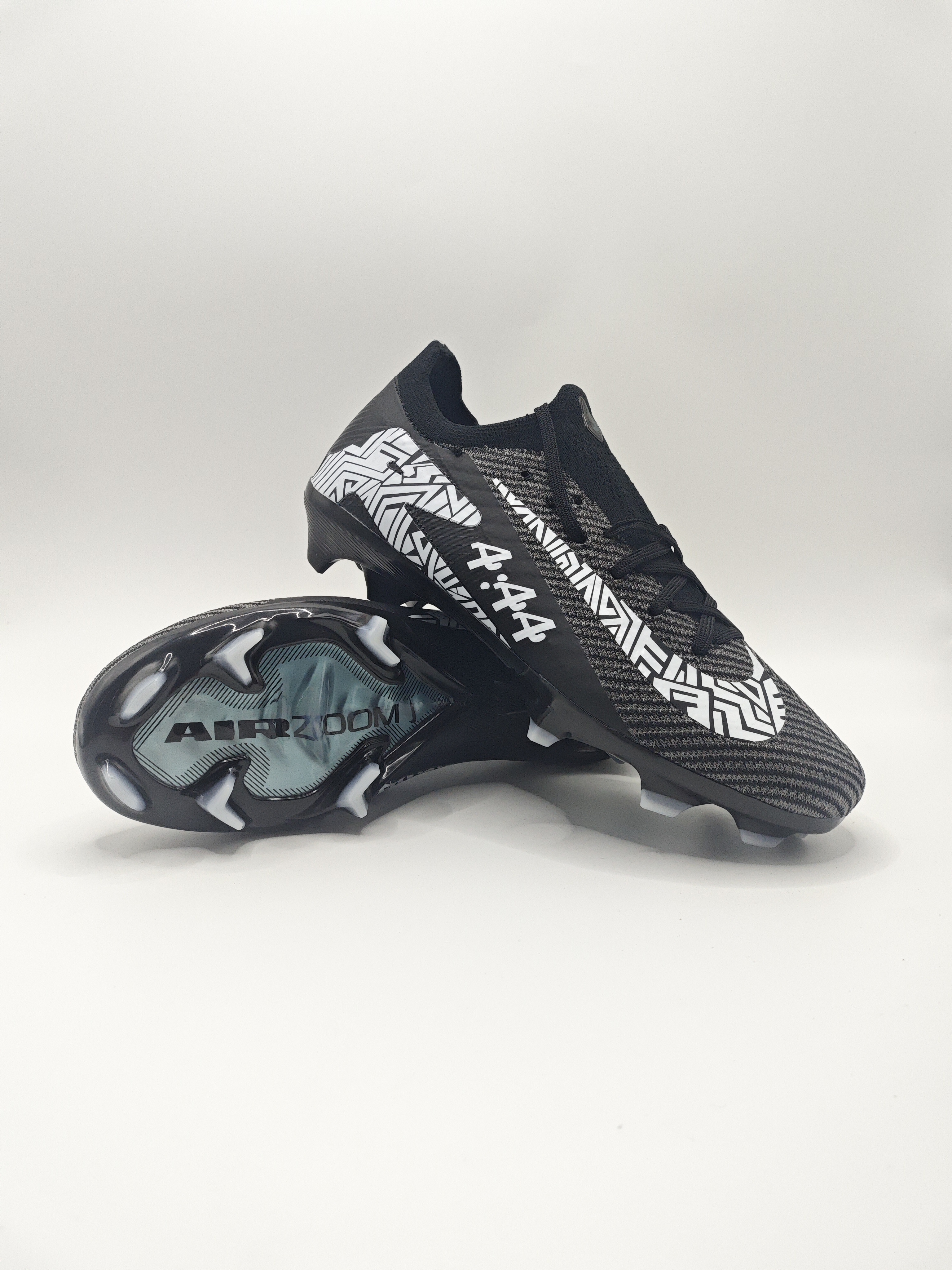 Nike Mercurial 16 FG Soccer Cleats with Built-in Bonded Pack: Full Air Cushion for All-Game Comfort, Waterproof Knit for Wet Fields