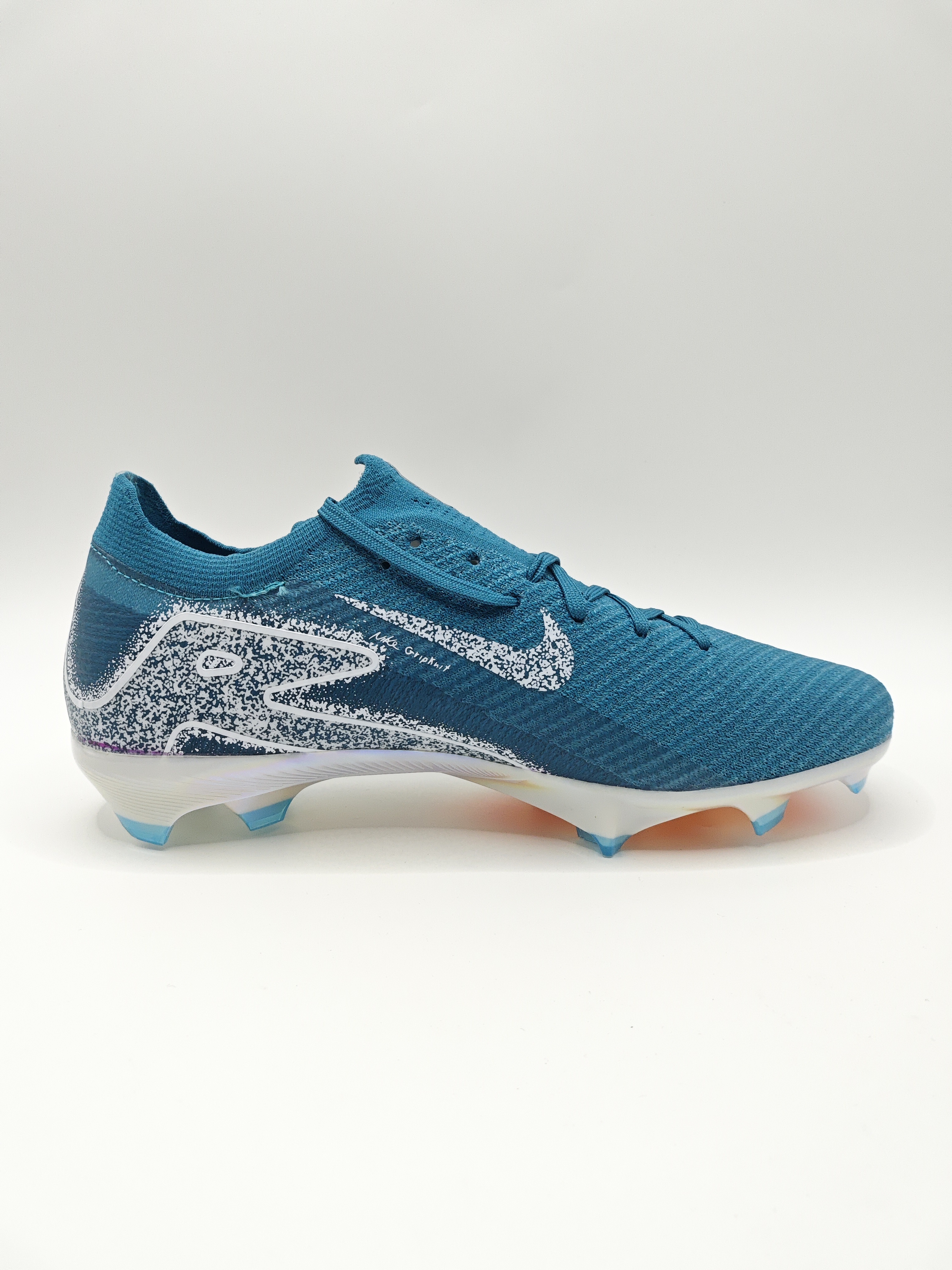 Nike Mercurial 16 FG Soccer Cleats with Built-in Bonded Pack: Full Air Cushion for All-Game Comfort, Waterproof Knit for Rainy Pitches