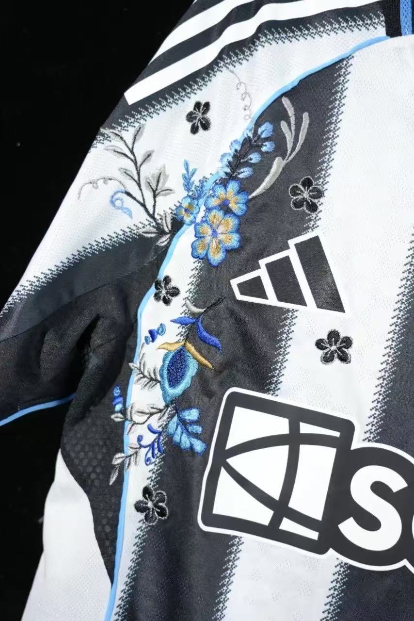 Newcastle United 2023/24 Home Special Edition Jersey – Black & White Stripes with Blue Floral Embroidery